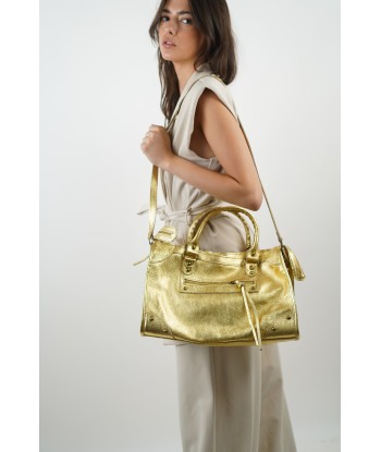 Goldene Clara-Tasche les muscles