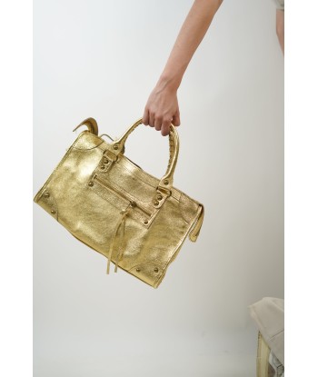 Goldene Clara-Tasche les muscles