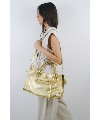 Goldene Clara-Tasche les muscles